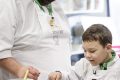 Chef Matei Baran and his son prepare a meal